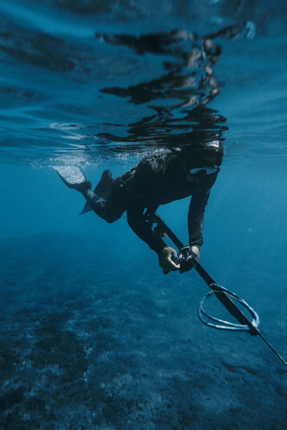 Photo of someone sparefishing underwater in Lombok with Magic Fishing